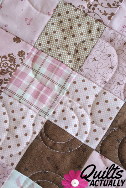 Pink and Brown longarm quilt closeup